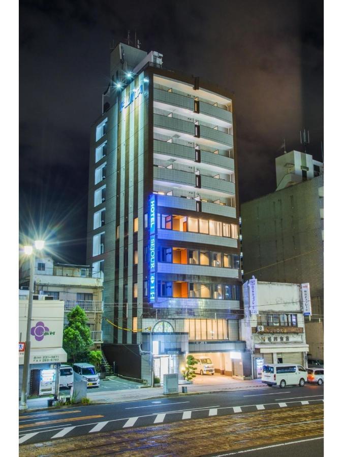 Sejour Inn Capsule Hiroshima Exterior photo